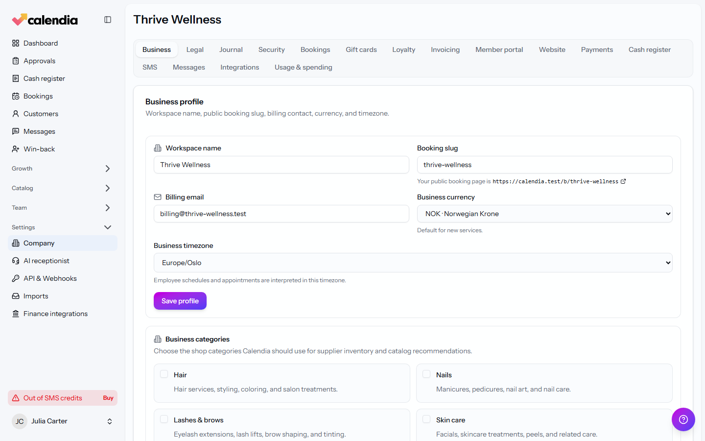 The Business tab of Company settings with workspace name, currency, and timezone fields.